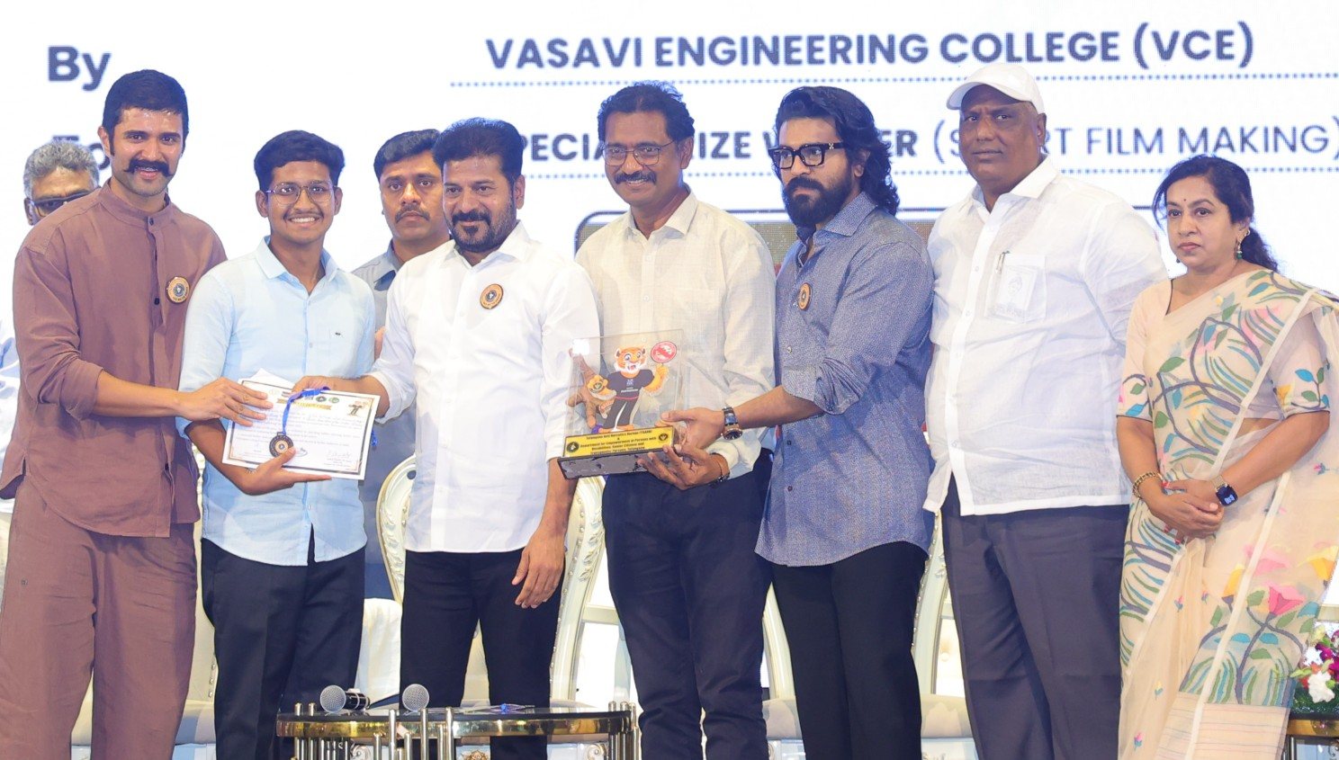 Praneeth on stage receiving the Anti-Drug Awareness Soldier medal and certificate from the Hon'ble Chief Minister of Telangana, Shri Anumula Revanth Reddy